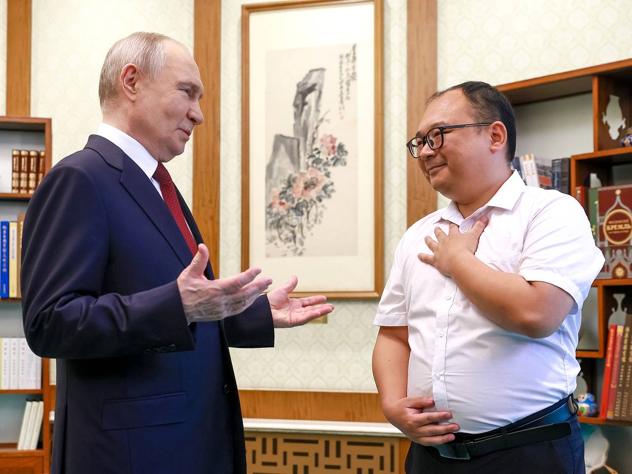 Путин повстречал взятого на руки 25 лет назад китайца